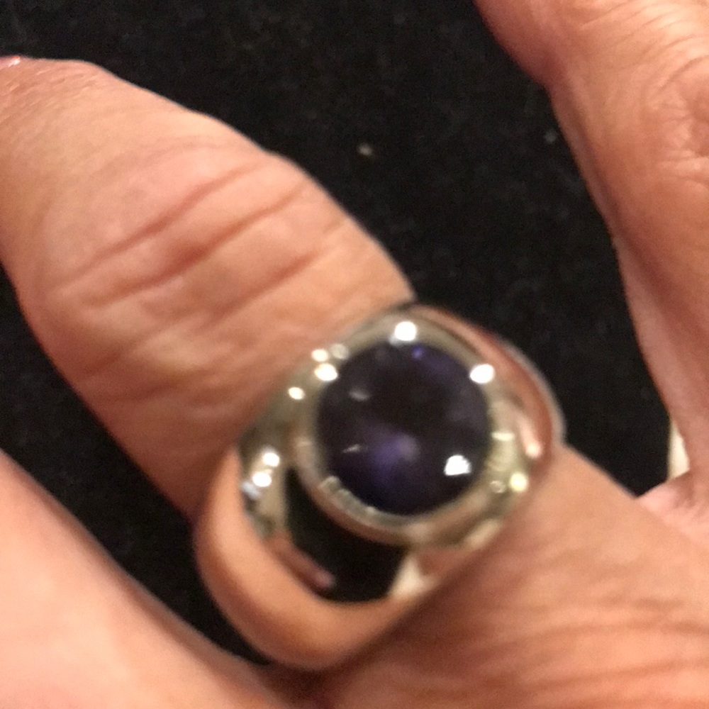Sterling Silver raised round “amethyst “stone sz7